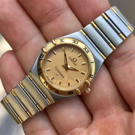 omega constellation ladies two tone.